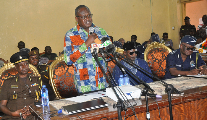   Mr Prosper Bani (standing) addressing members of the National House of Chiefs in Kumasi. Those with him from right are the Inspector General of Police, Mr John Kudalor; the Minister of Chieftaincy and Traditional Affairs, Dr Henry Seidu Dannaa; and the acting Director General of the Ghana Prisons Service, Mr Emmanuel Adzakor.  Picture: EMMANUEL BAAH